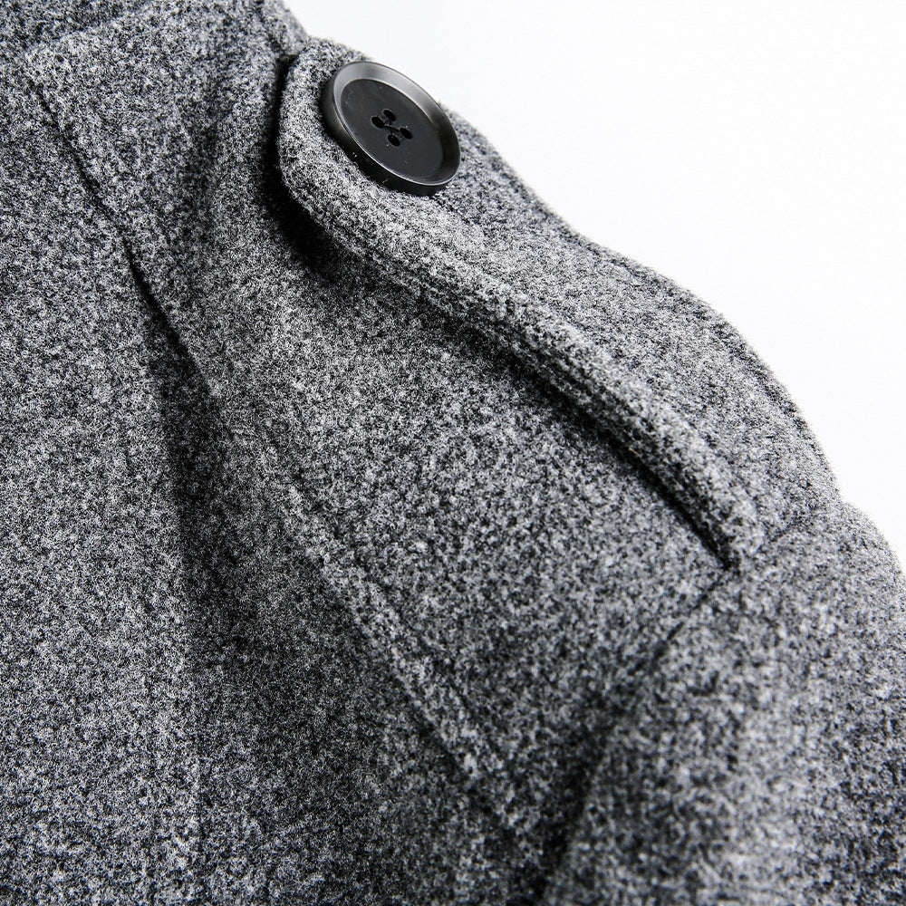Manteau en laine à col montant et double boutonnage