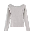 Slanted shoulder open shoulder long sleeved top