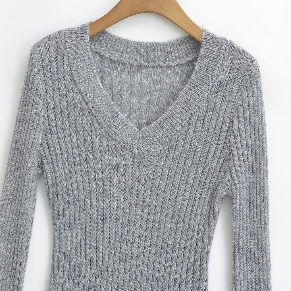 Haut à manches longues, col en V, coupe slim et bandeau élastique