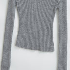 Haut à manches longues, col en V, coupe slim et bandeau élastique