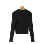 Round neck single breasted long sleeved top