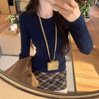 Top tricoté pour femme avec col rond creux unique, coupe ajustée, élégant et amincissant, à porter en dessous