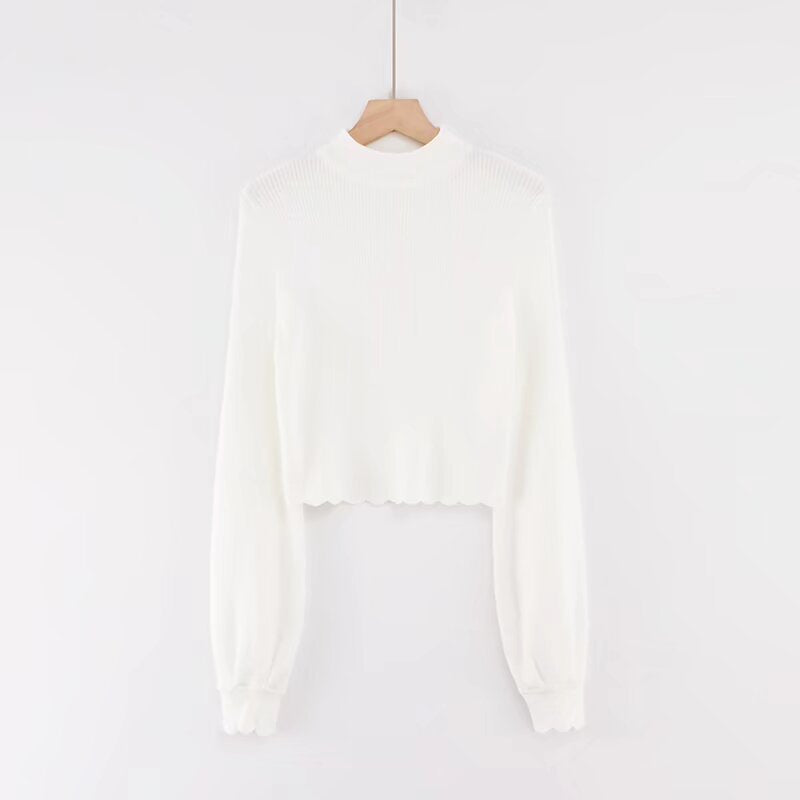 Long sleeved half high neck lotus leaf sweater