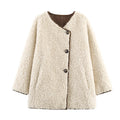 Manteau ample en suède et fourrure d'agneau